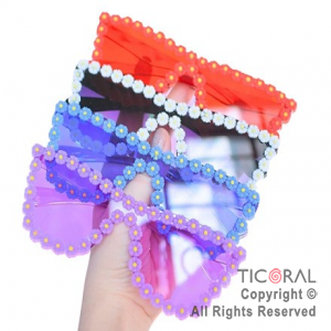 ANTEOJO RECTANGULAR FLORES MARGARITAS COLORES SURTIDOS x 1